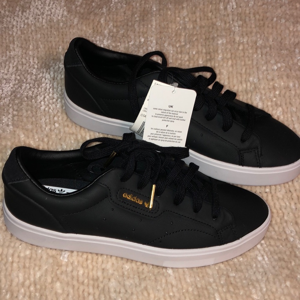 Adidas sleek black sneakers